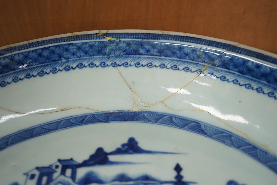 A collection of 18th century and later Chinese porcelain to include tea bowls and saucers and a large dish (a.f), largest 33cm in diameter